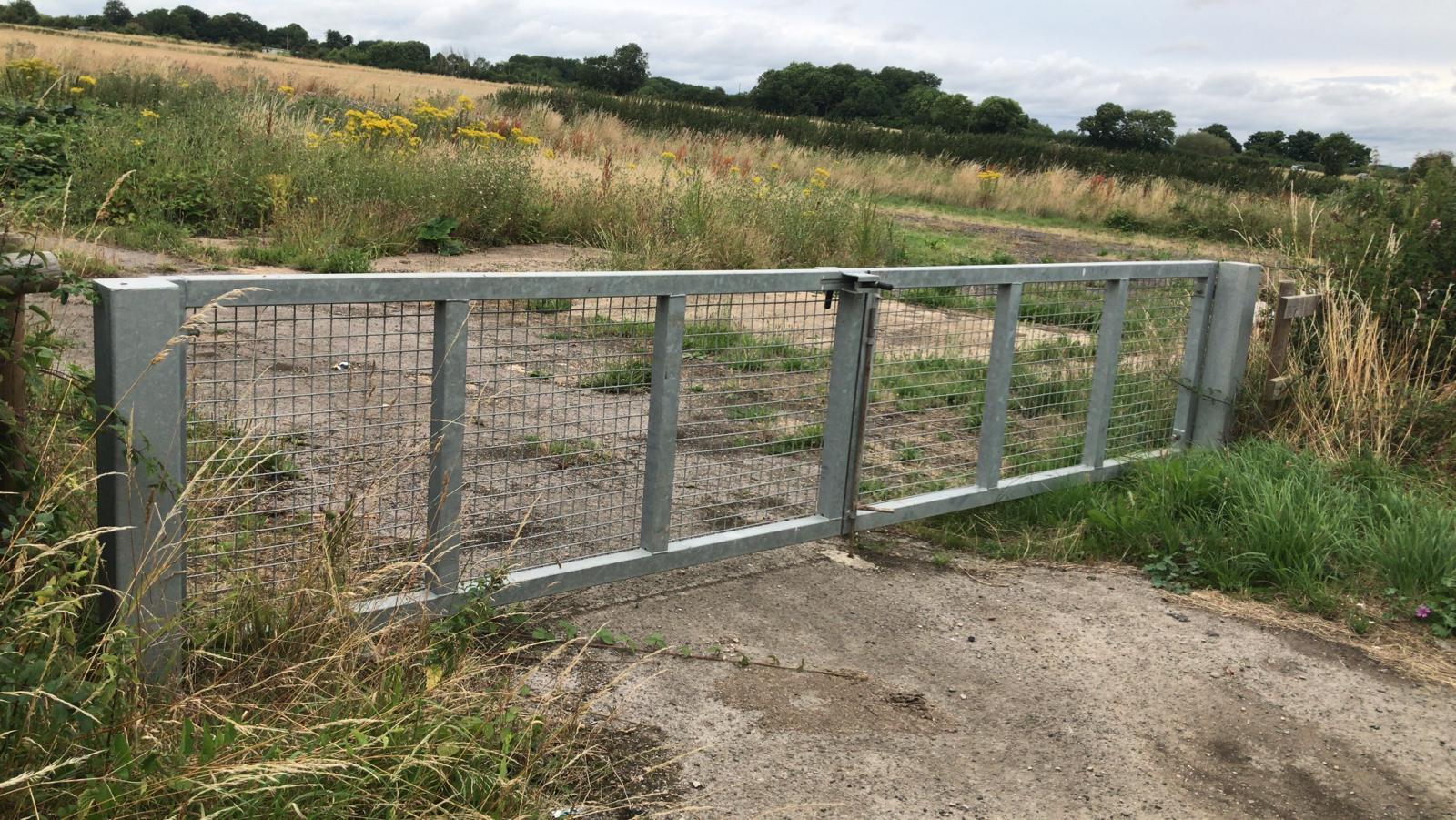 Yellow height restriction barrier at Amesbury Town Council car park.