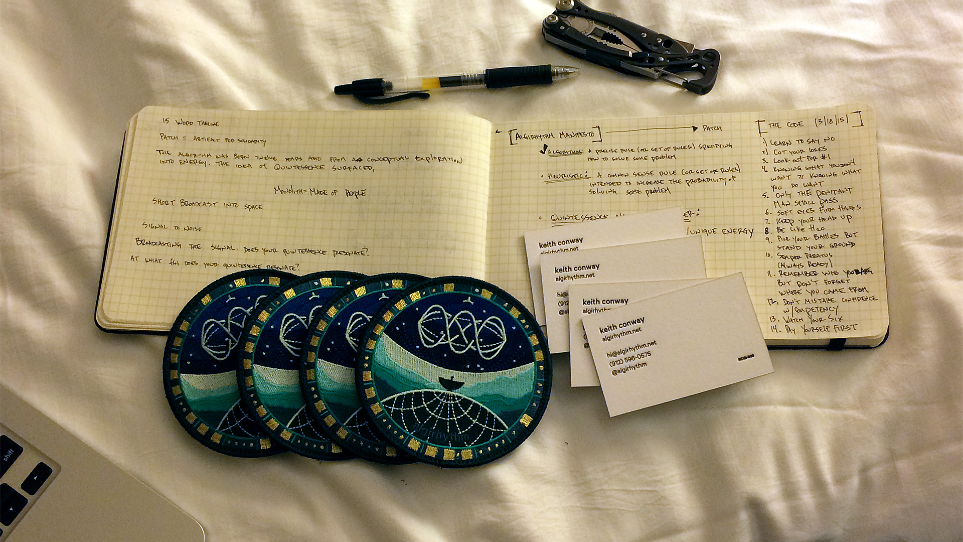 Image of patches and sketchbook.