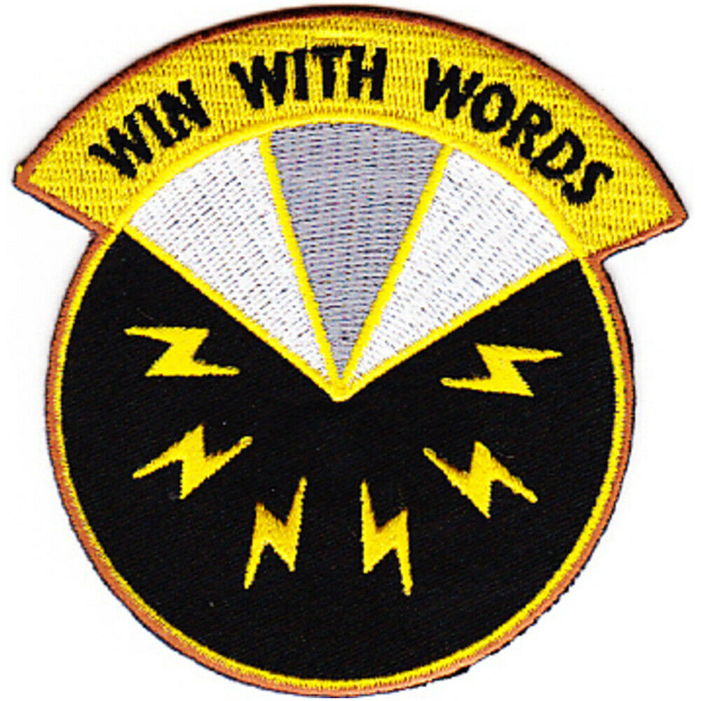 Image of sketchbook and patches.