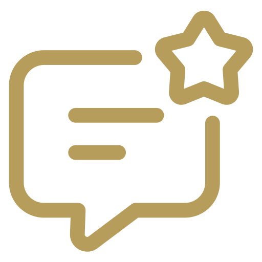 Icon of a speech bubble with lines representing text and a star at the top right corner, symbolizing a featured review or rating.