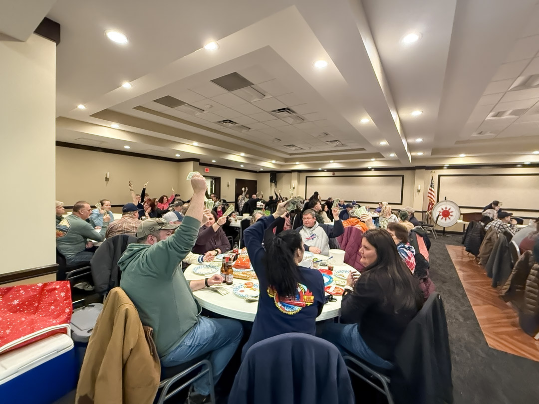 People participating in the Adams Fire Company meat raffle in North Tonawanda.