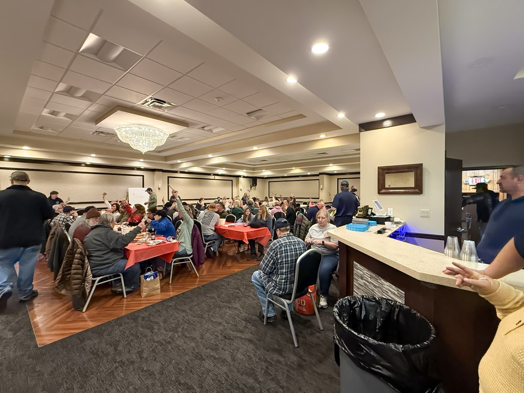 People participating in the Adams Fire Company meat raffle in North Tonawanda.