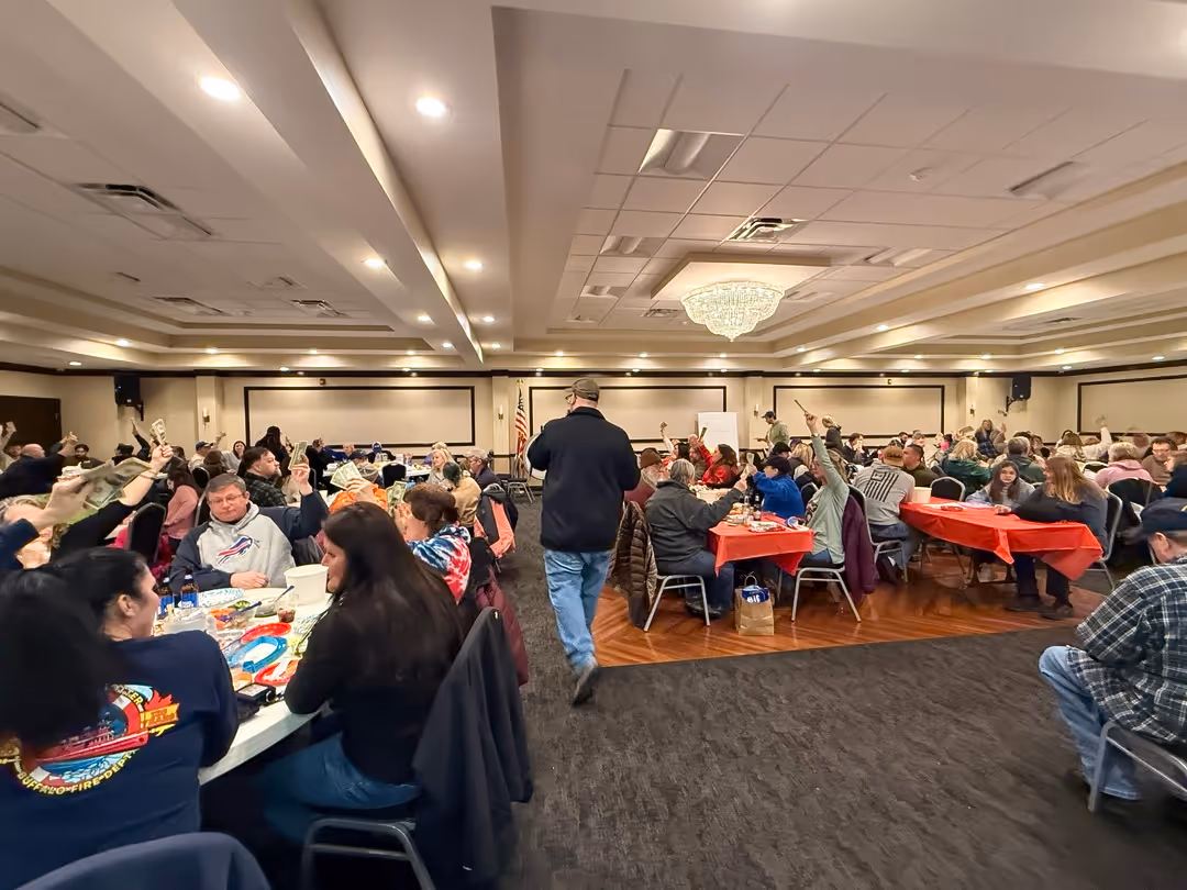 People participating in the Adams Fire Company meat raffle in North Tonawanda.