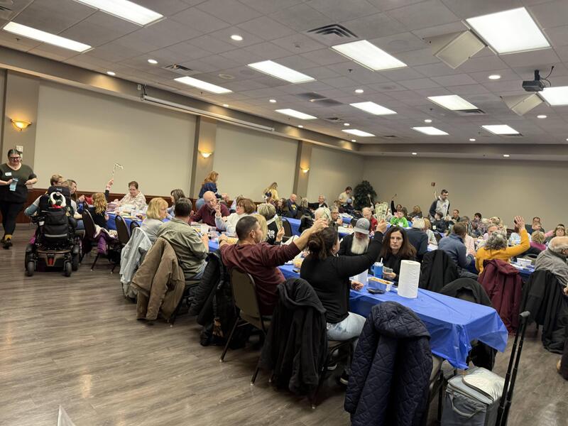 People participating in the C-Hope Western New York meat raffle in Williamsville.