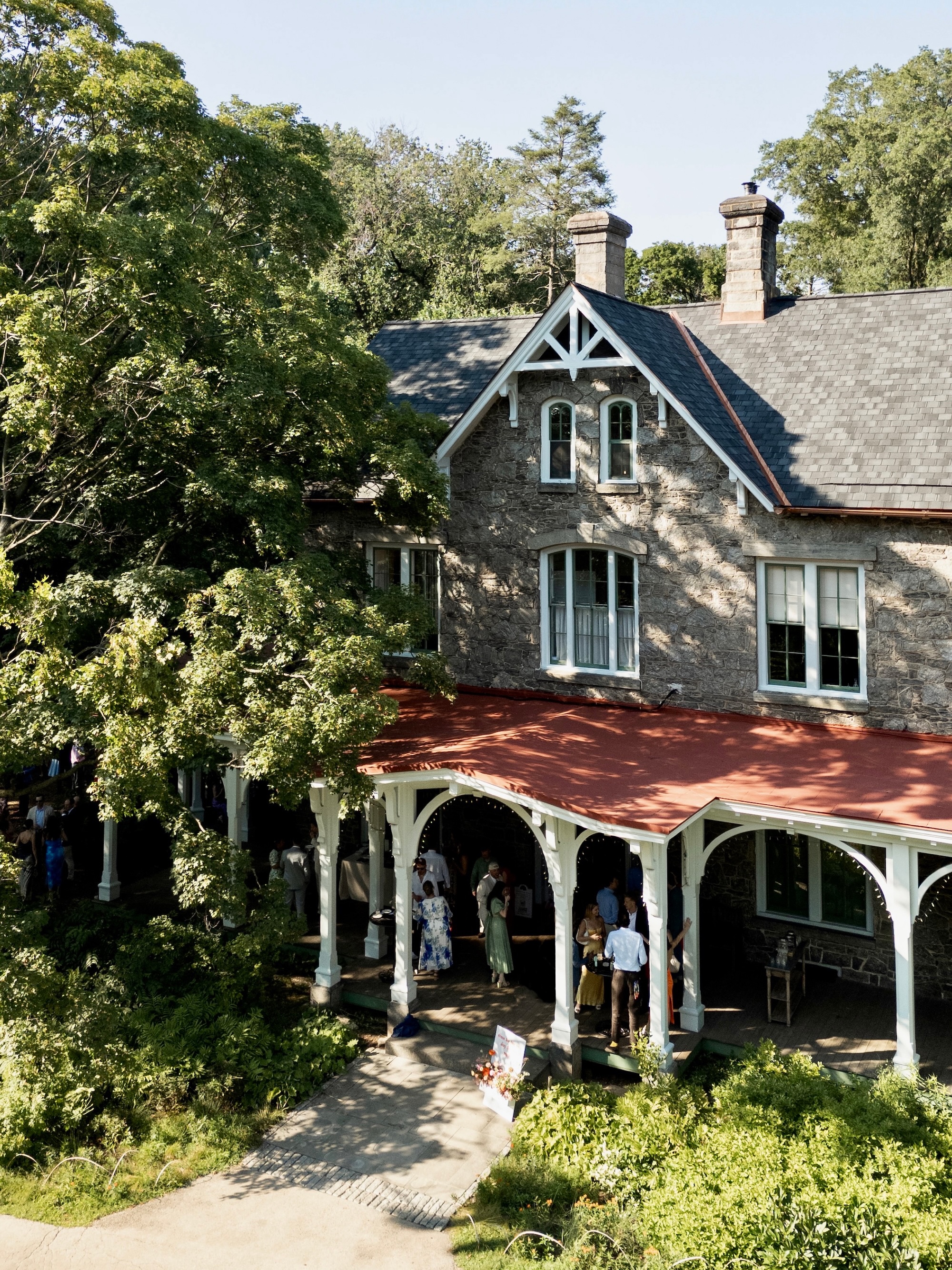 Overhead view of Portico's Cope House with wrap-around porch and Victorian-style mansion