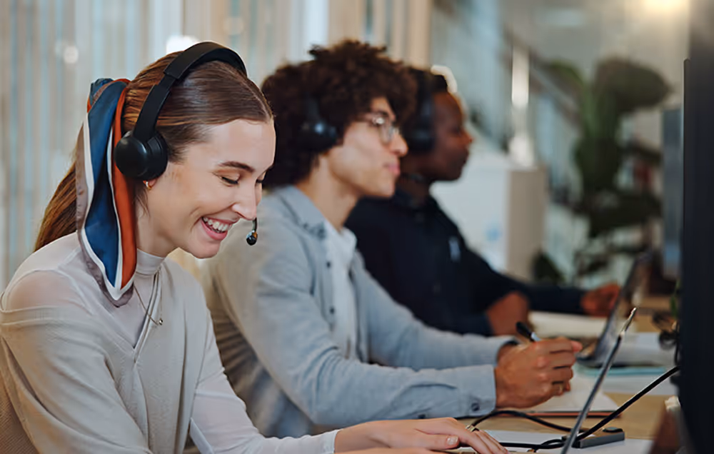 Person speaking to a customer taking payments over the phone