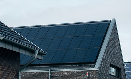 Solar panels on the side of a house's roof