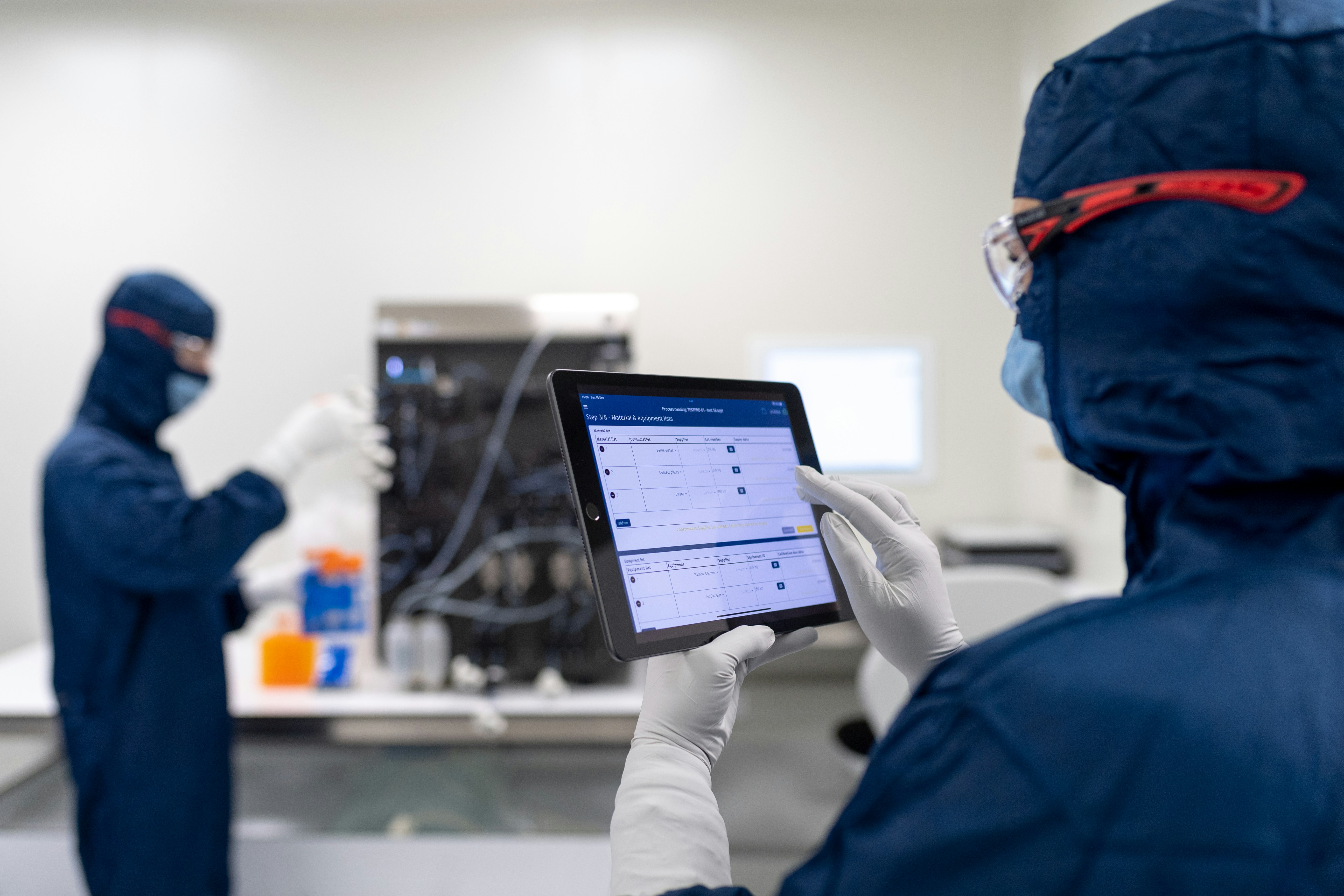 A materials scientist reviewing product and material data on a connected platform.