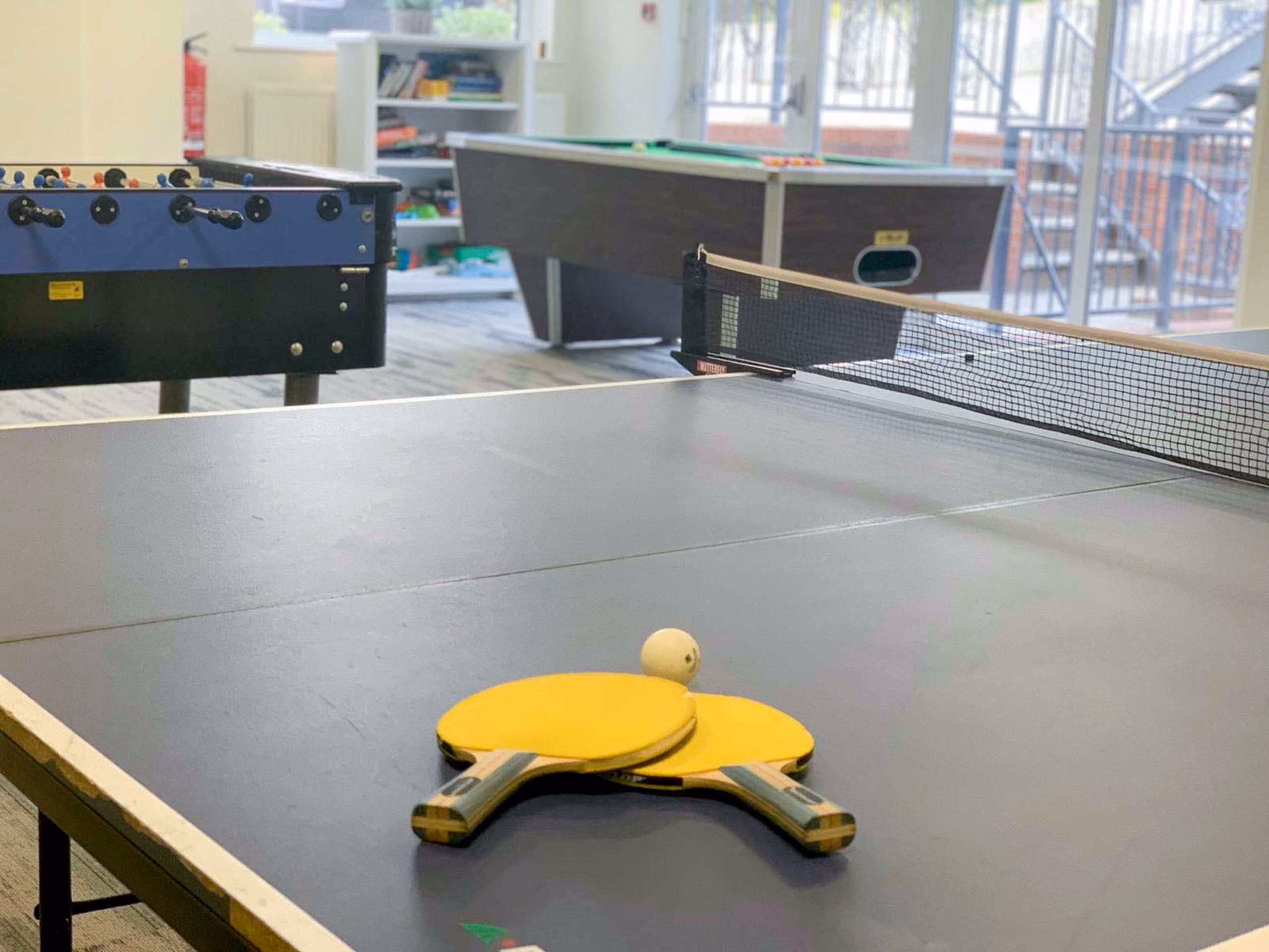 Have a game of table tennis, foosball or pool in our games room.