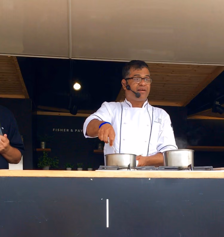 Hotel Collingwood head chef showing them how it's done.