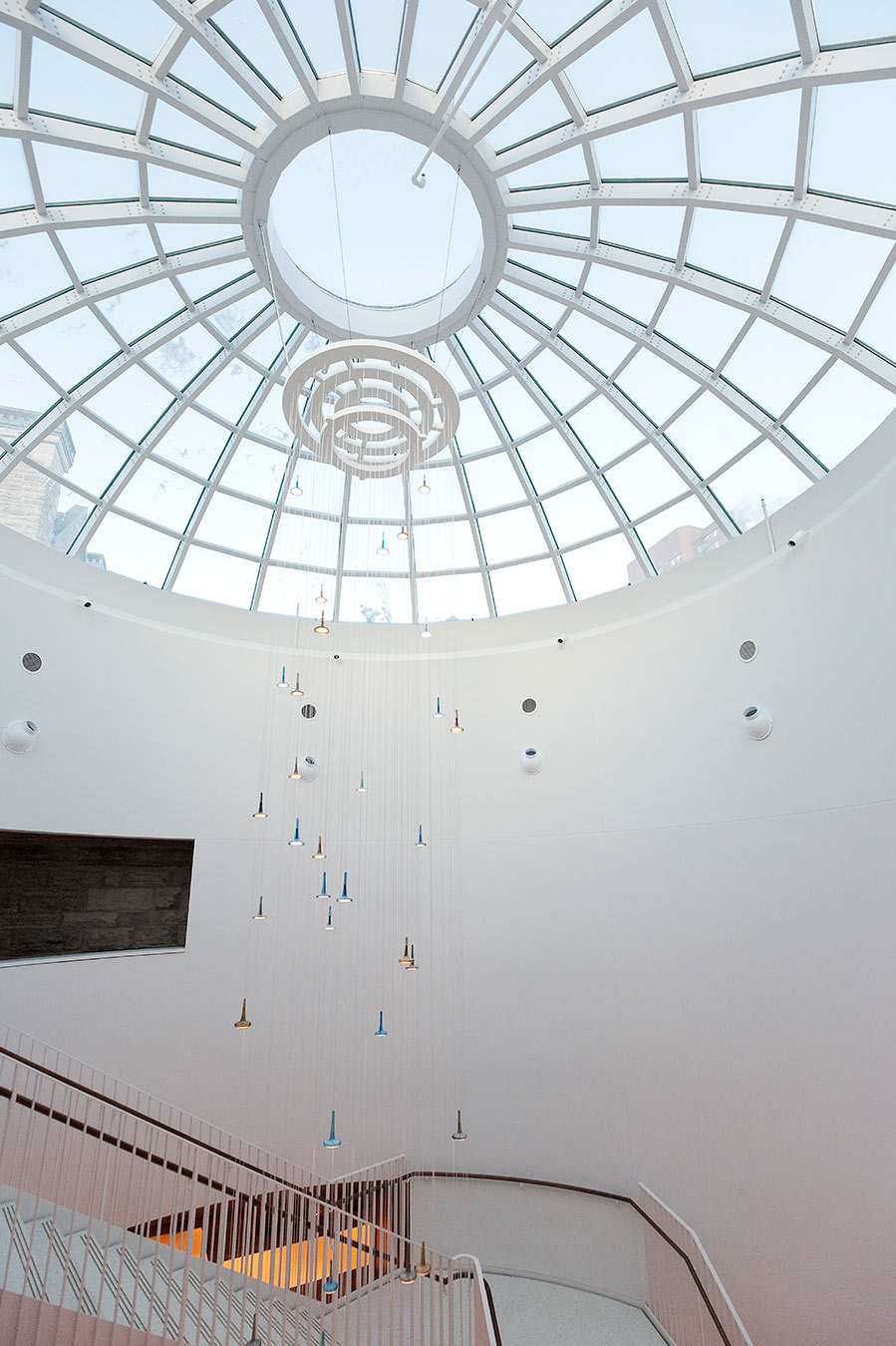 Acoustical Plaster on sloped atrium walls around skylight  