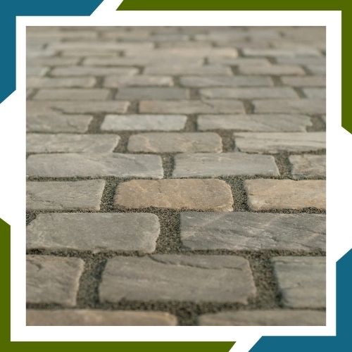 a stone pathway in a backyard