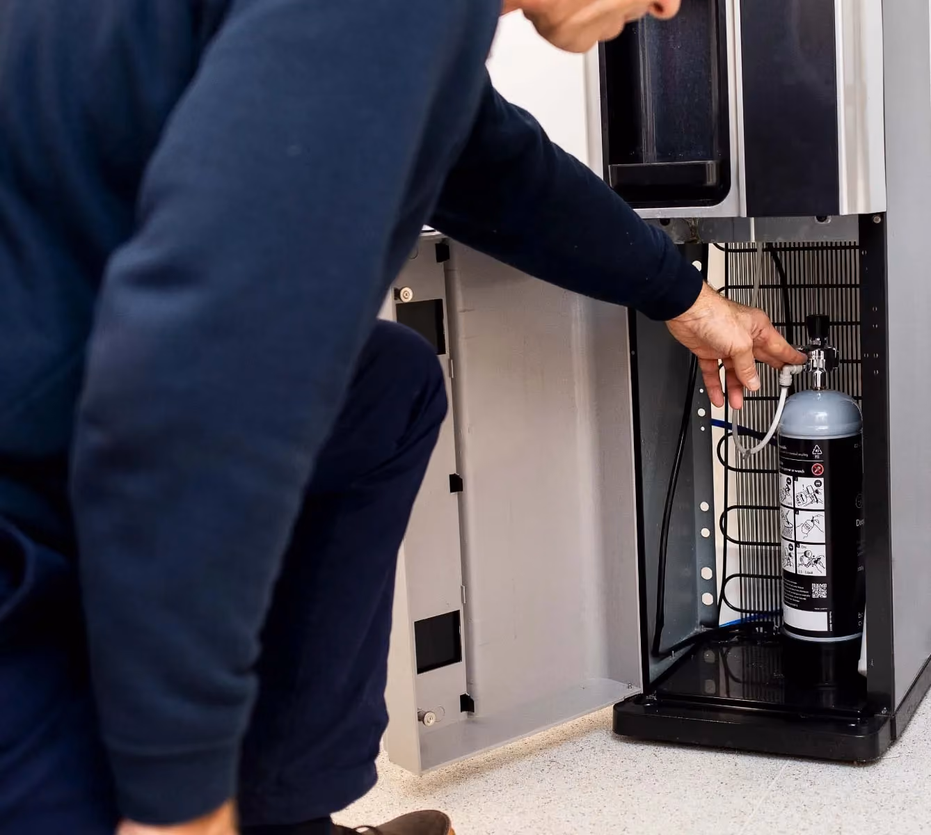 ows water cooler being serviced