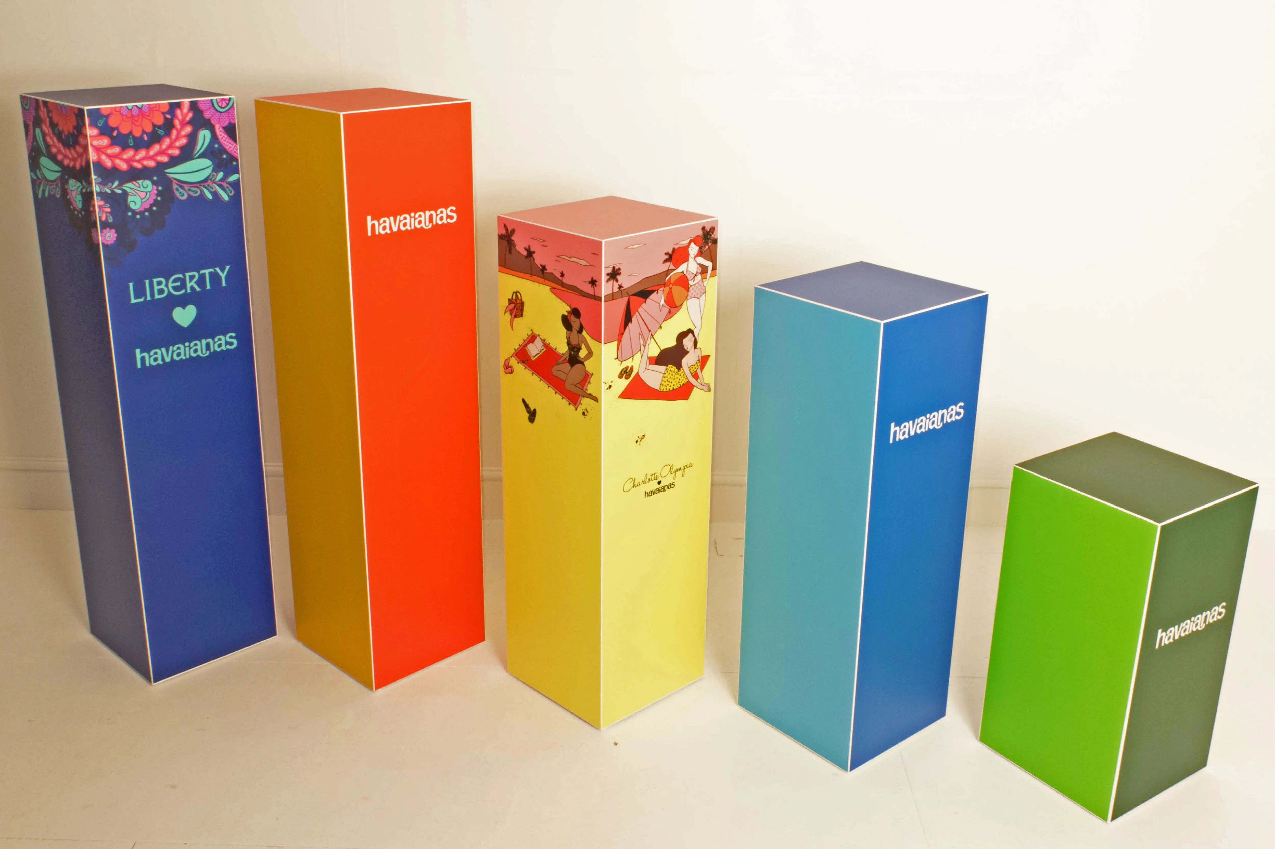 photo of various plinths with branding graphics on them