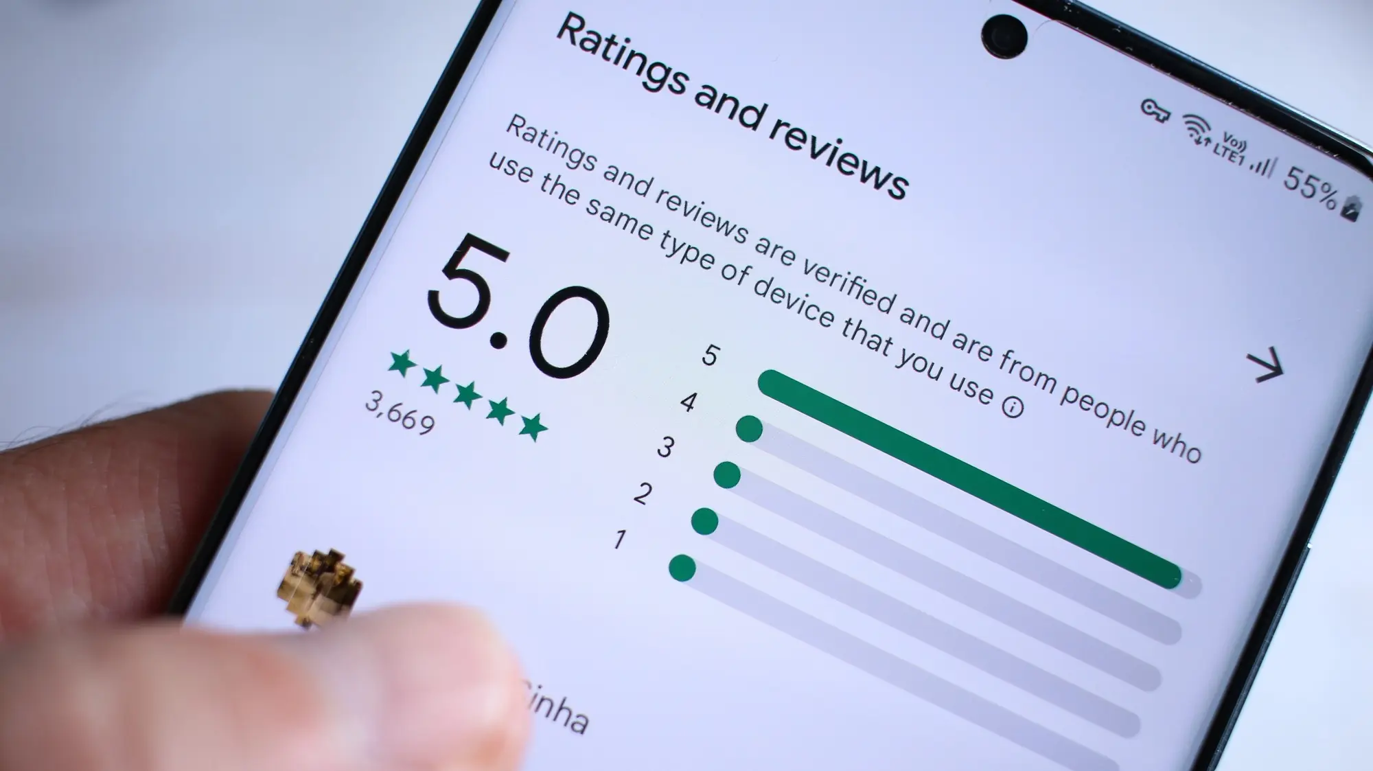Smartphone screen showing a 5.0-star rating with 3,669 reviews on an app's ratings and reviews page