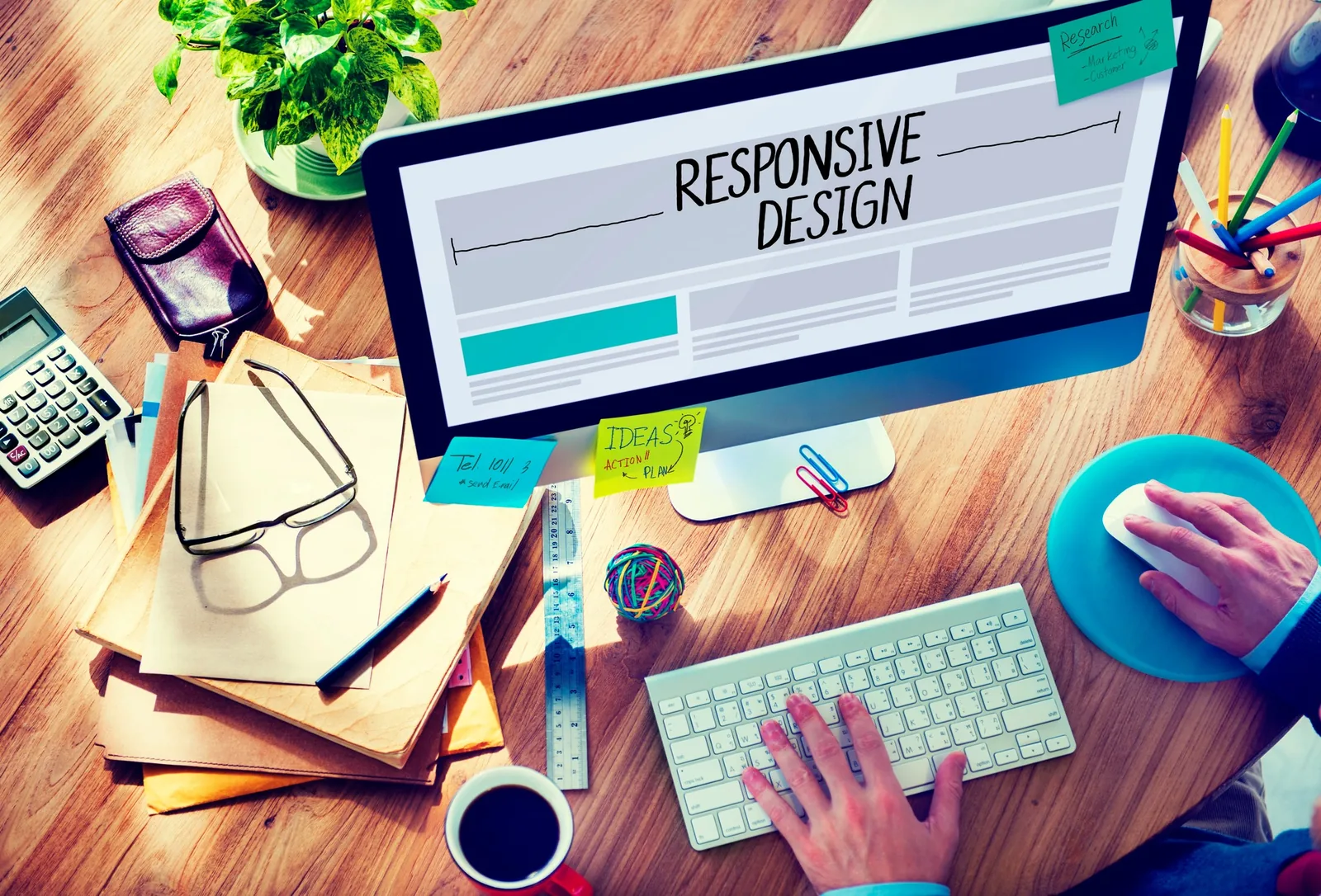 Responsive website design company creating a modern web layout on a desktop computer
