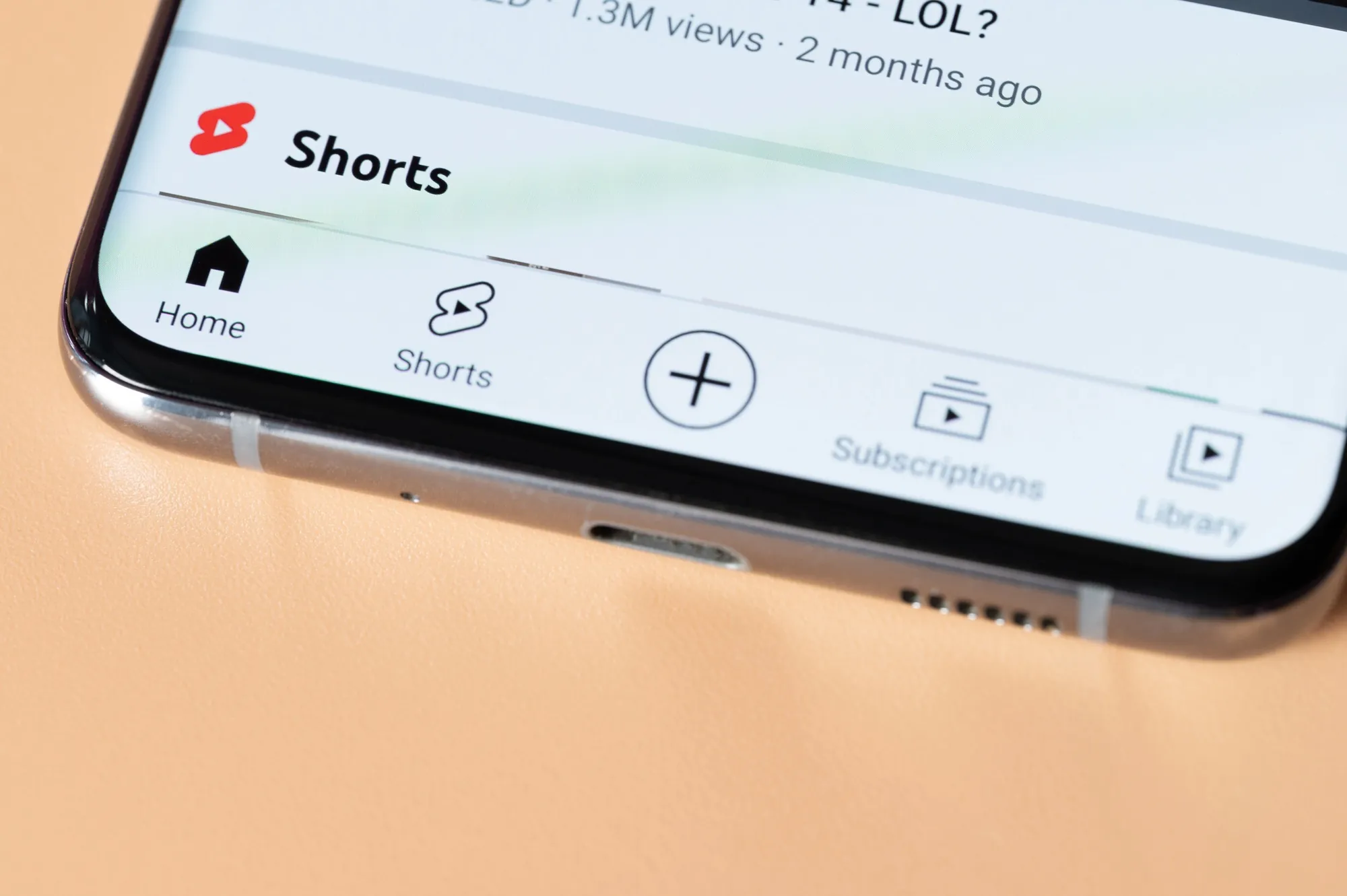 Close-up of the YouTube Shorts interface on a smartphone screen representing short-form video marketing