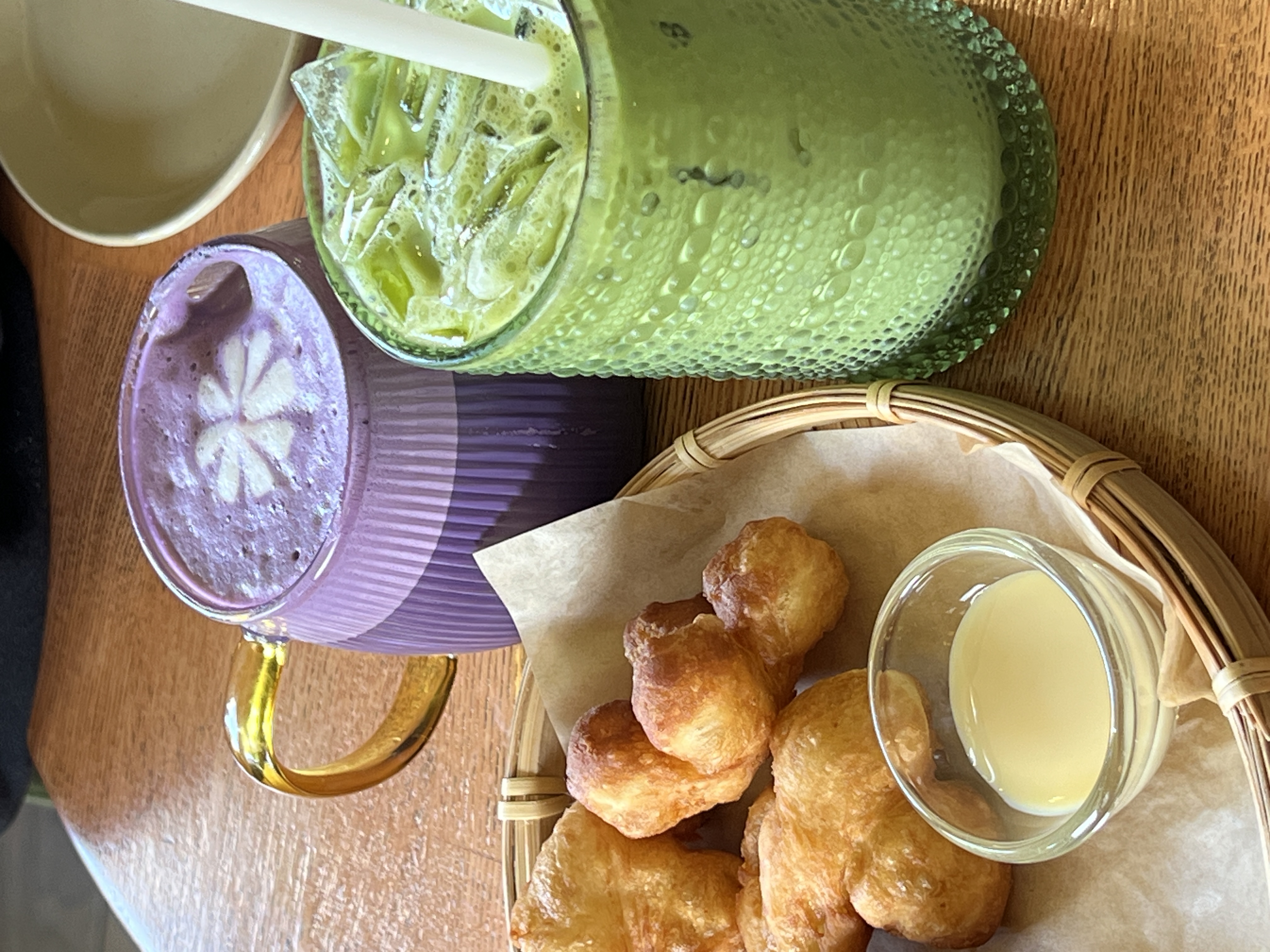 Matcha latte, ube latte, and beignets