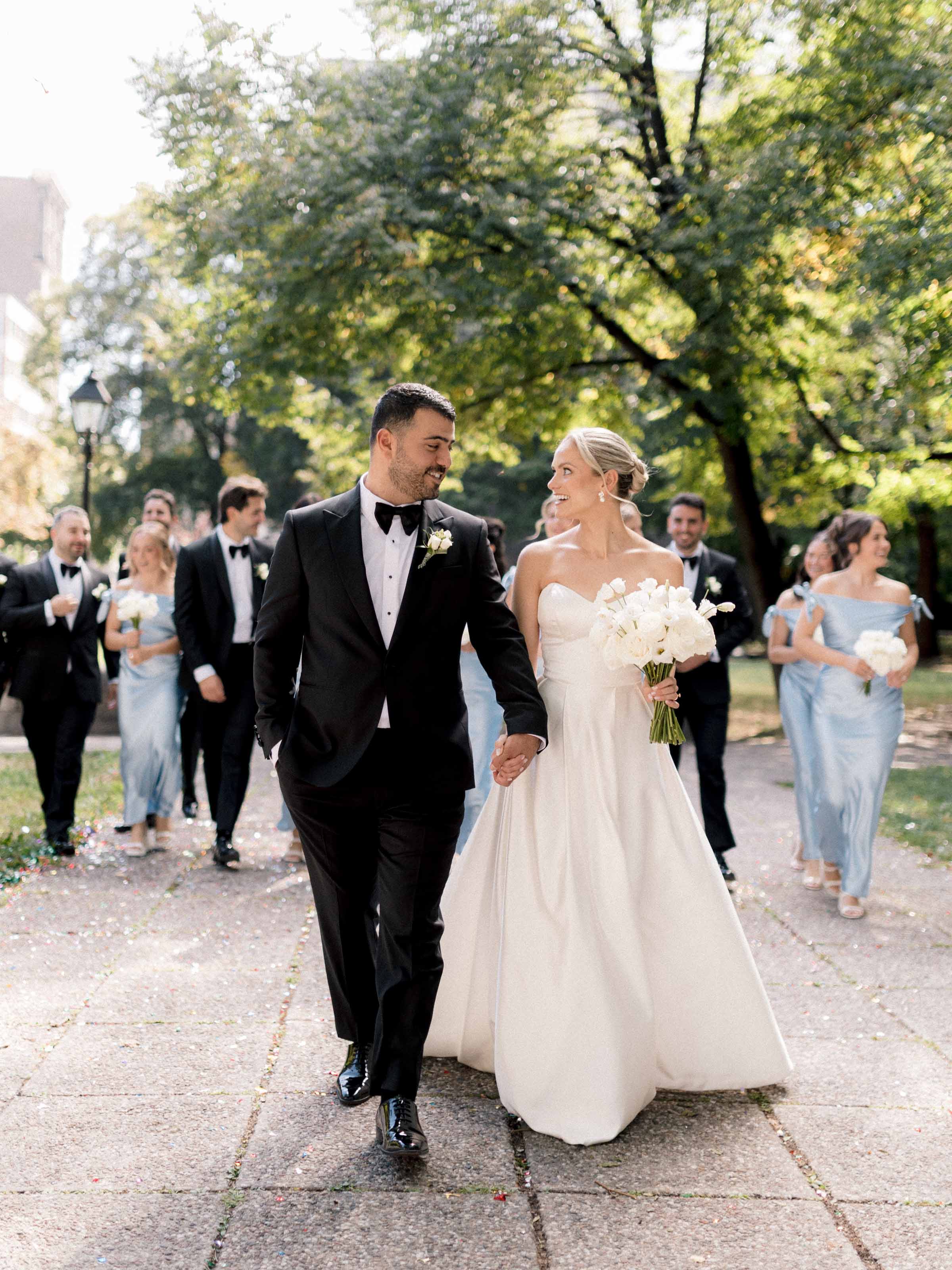 Bride and groom walking back down the aisle after their ceremony, Montréal