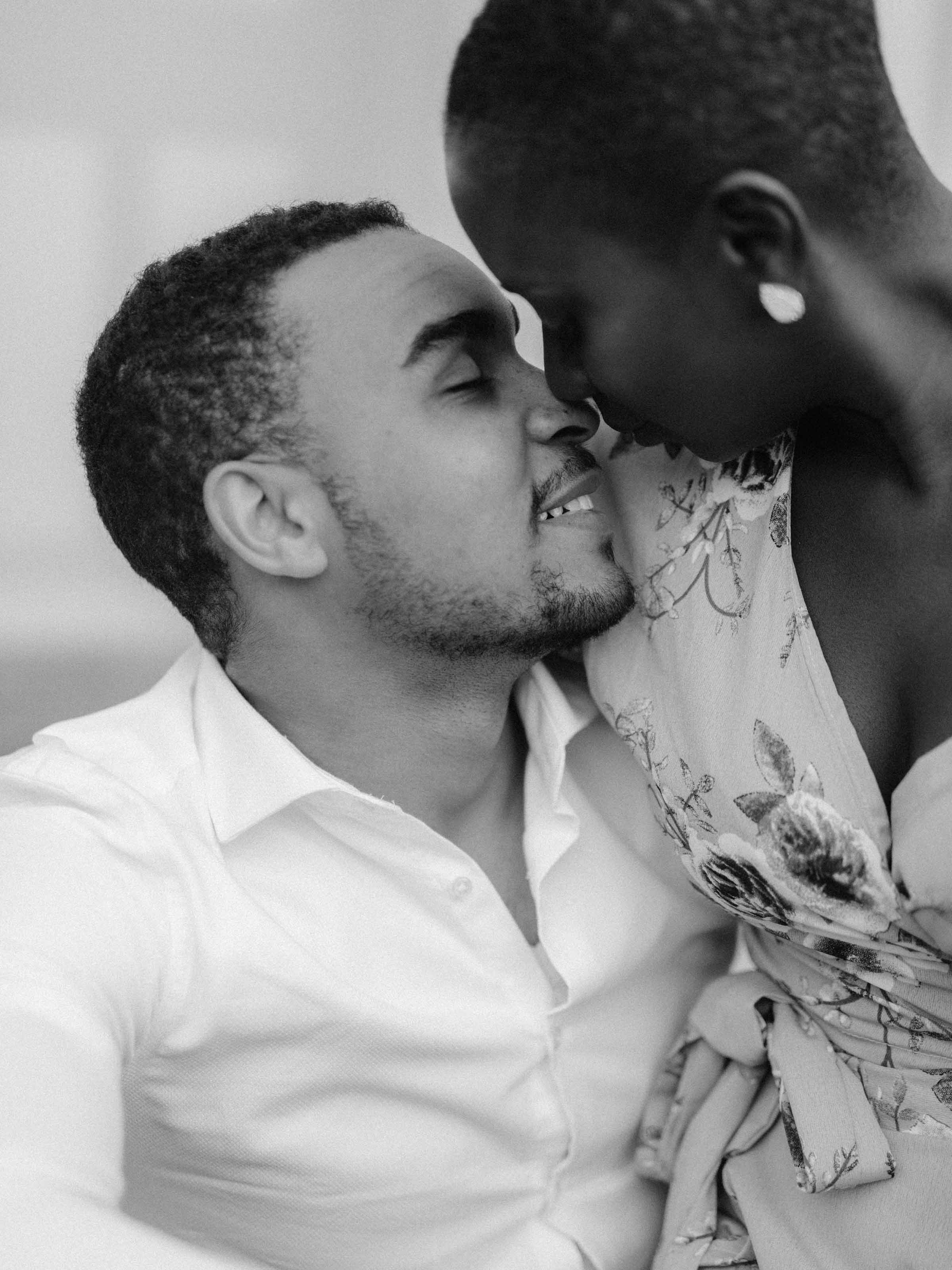 Engaged couple close together, black and white, Québec City