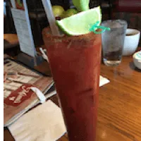 bloody mary with a lime wedge