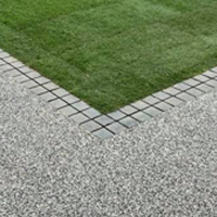 premium garden resin, framing the grass