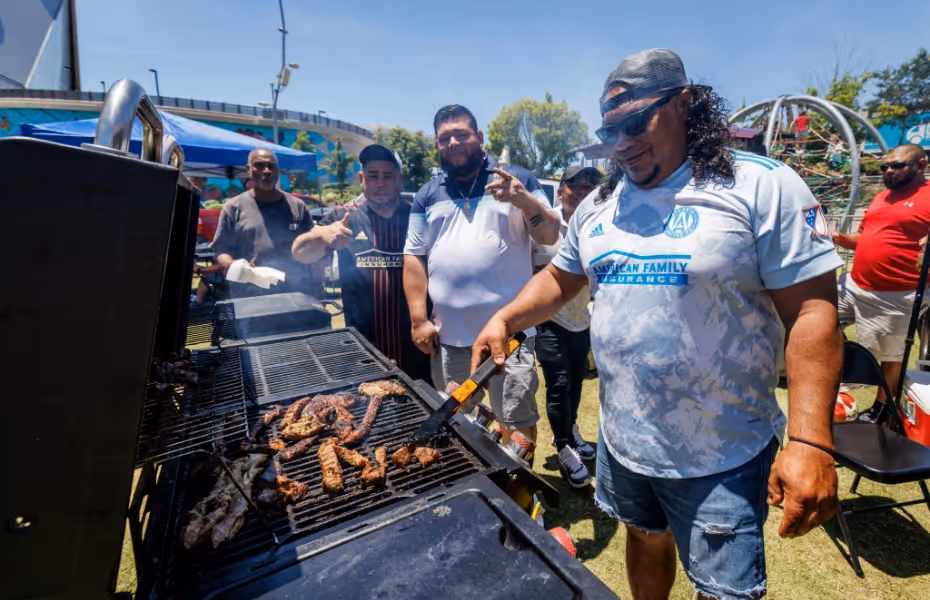 Fans tailgating at Home Depot Backyard