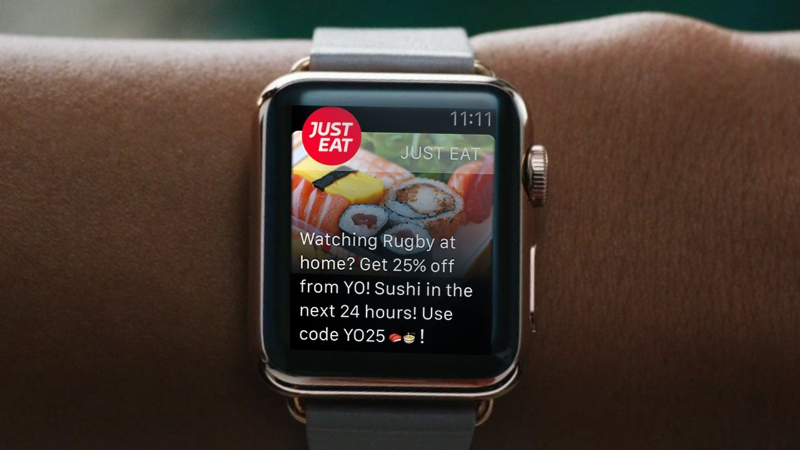 Apple Watch showing Just Eat app with a 25% off sushi promo and code YO25 at 11:11.