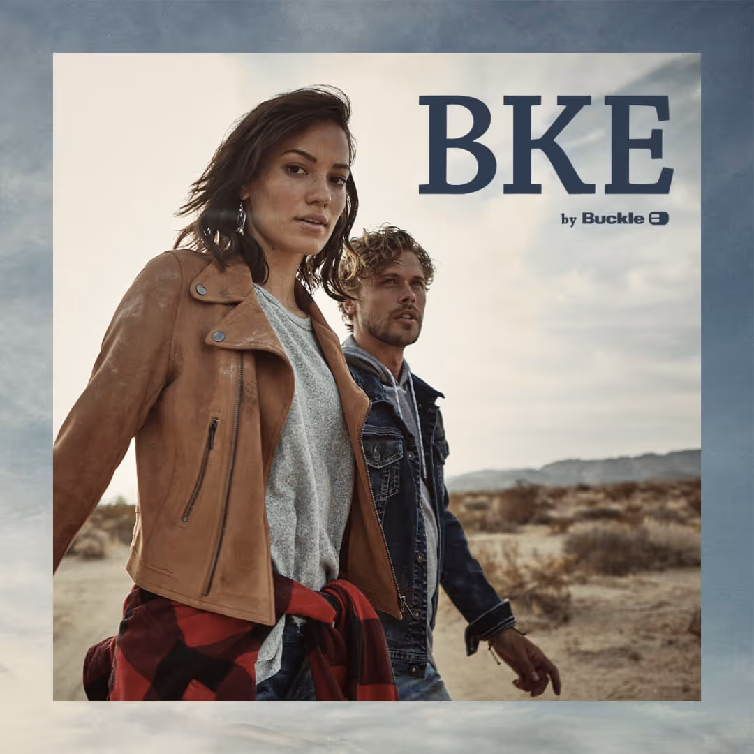 Young womman and man wearing BKE by Buckle apparel in a desert