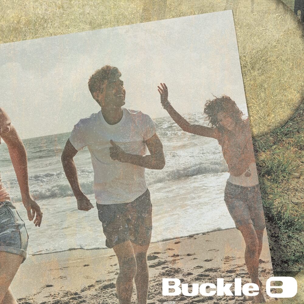 Faded photo of friends on a beach