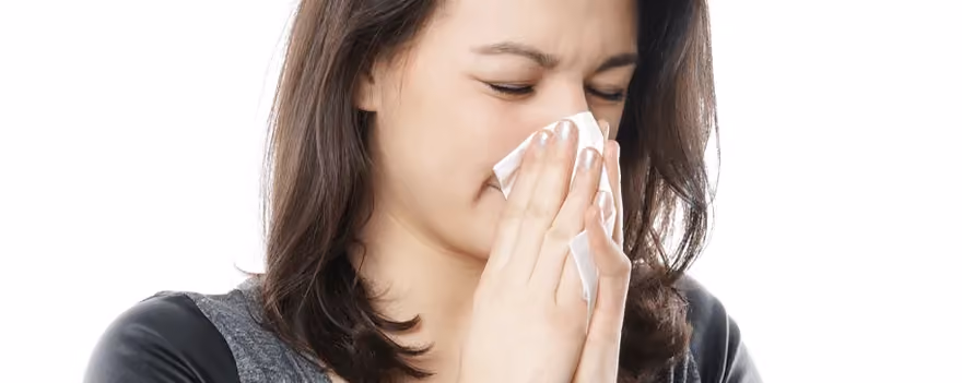 Woman suffering from recurrent sinus symptoms