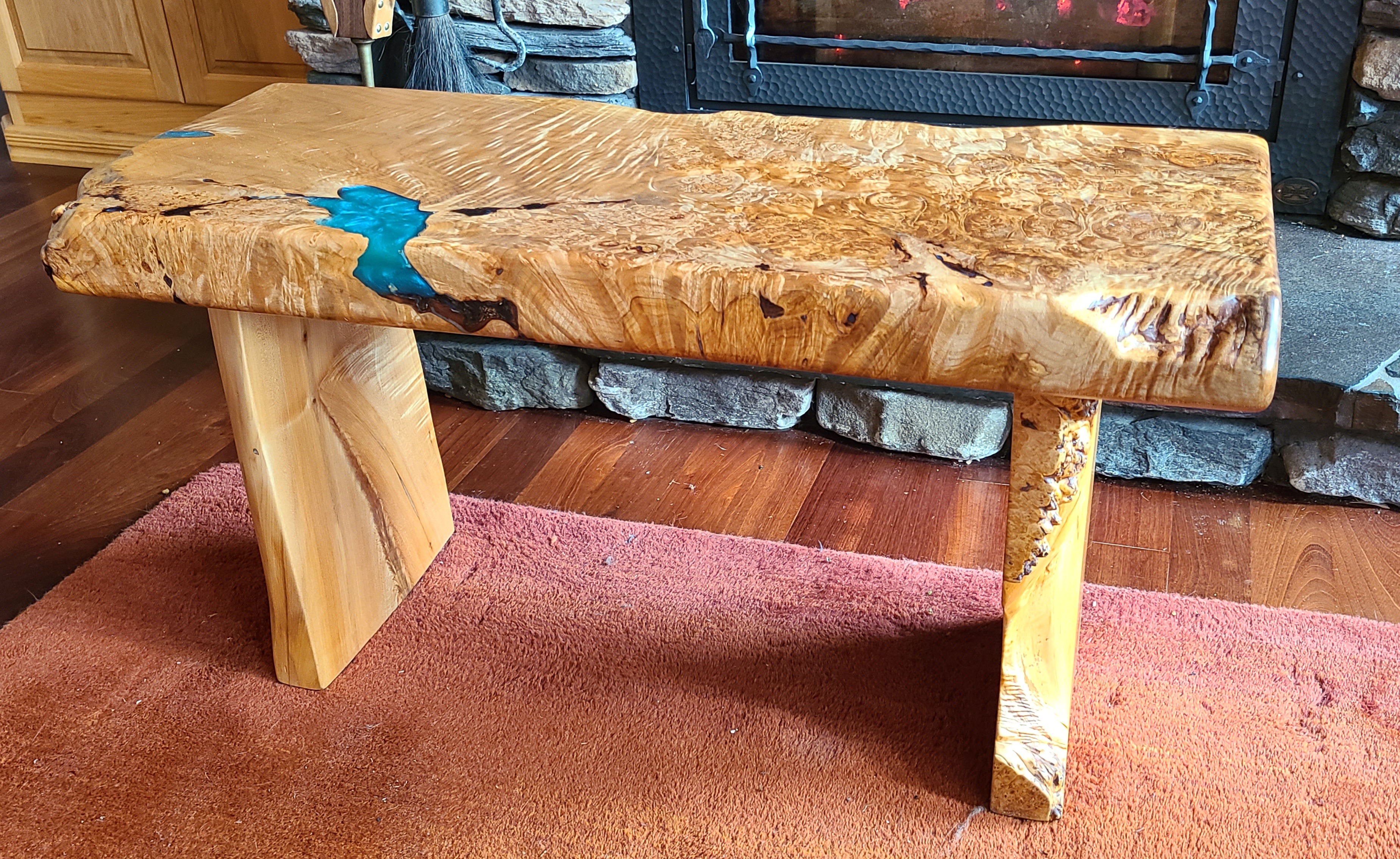 Live Edge Maple Slab Bench with Maple Slab Legs. Tongue Oil Finish. Teal Epoxy fill. Slab thickness 2.5". 34.5" x 14.5" x 18" high. 