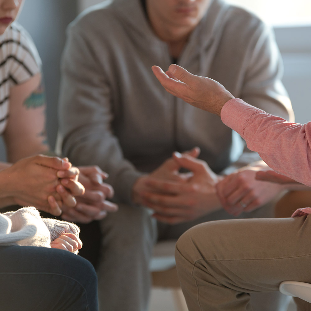 A group of our clients in a counselling session in our drug detox program.