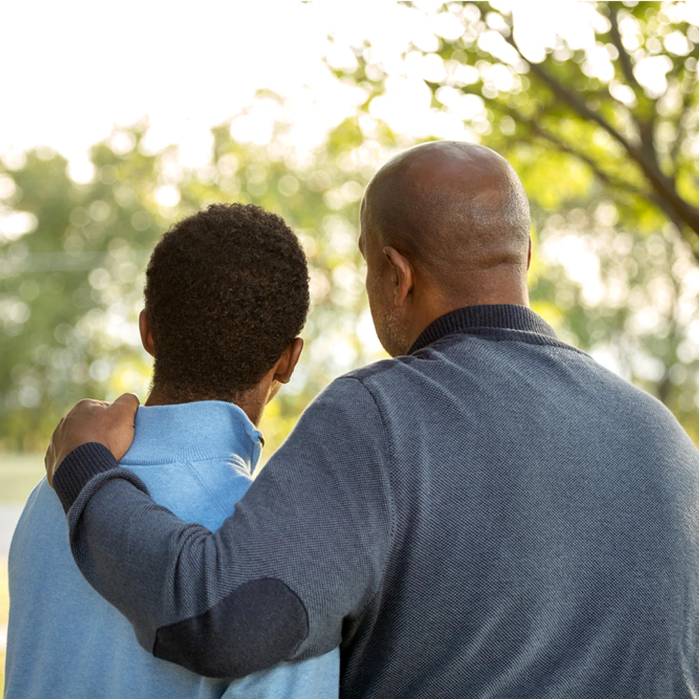 A father holds his teenage son, their backs to us, as they walk through a park towards a bright sun. Self-funding your rehab can give you the best chance at recovery, and of spending more time with your loved ones.