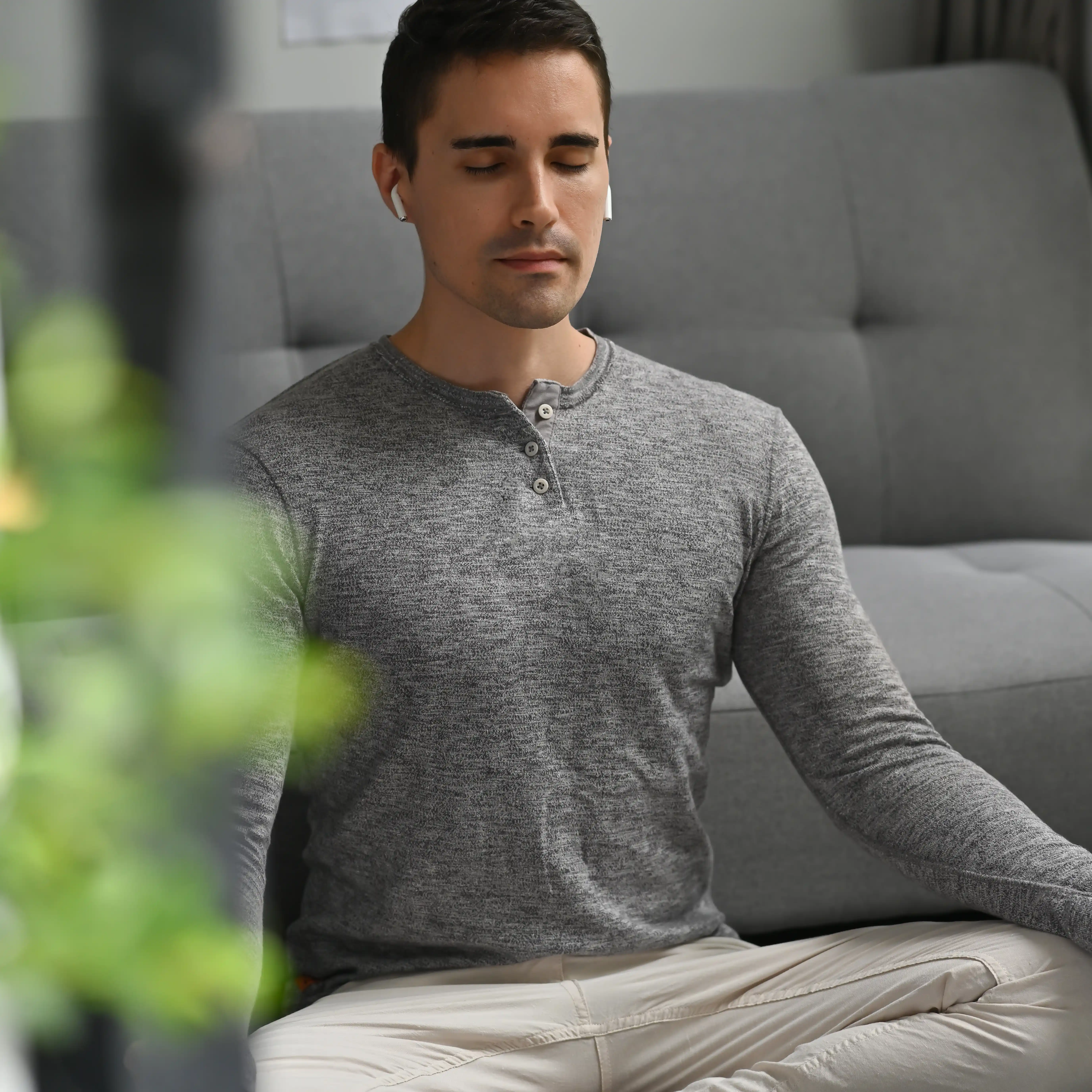 A young man practices meditation during inpatient rehab at The Hader Clinic, using mindfulness and movement to manage anxiety and support recovery.