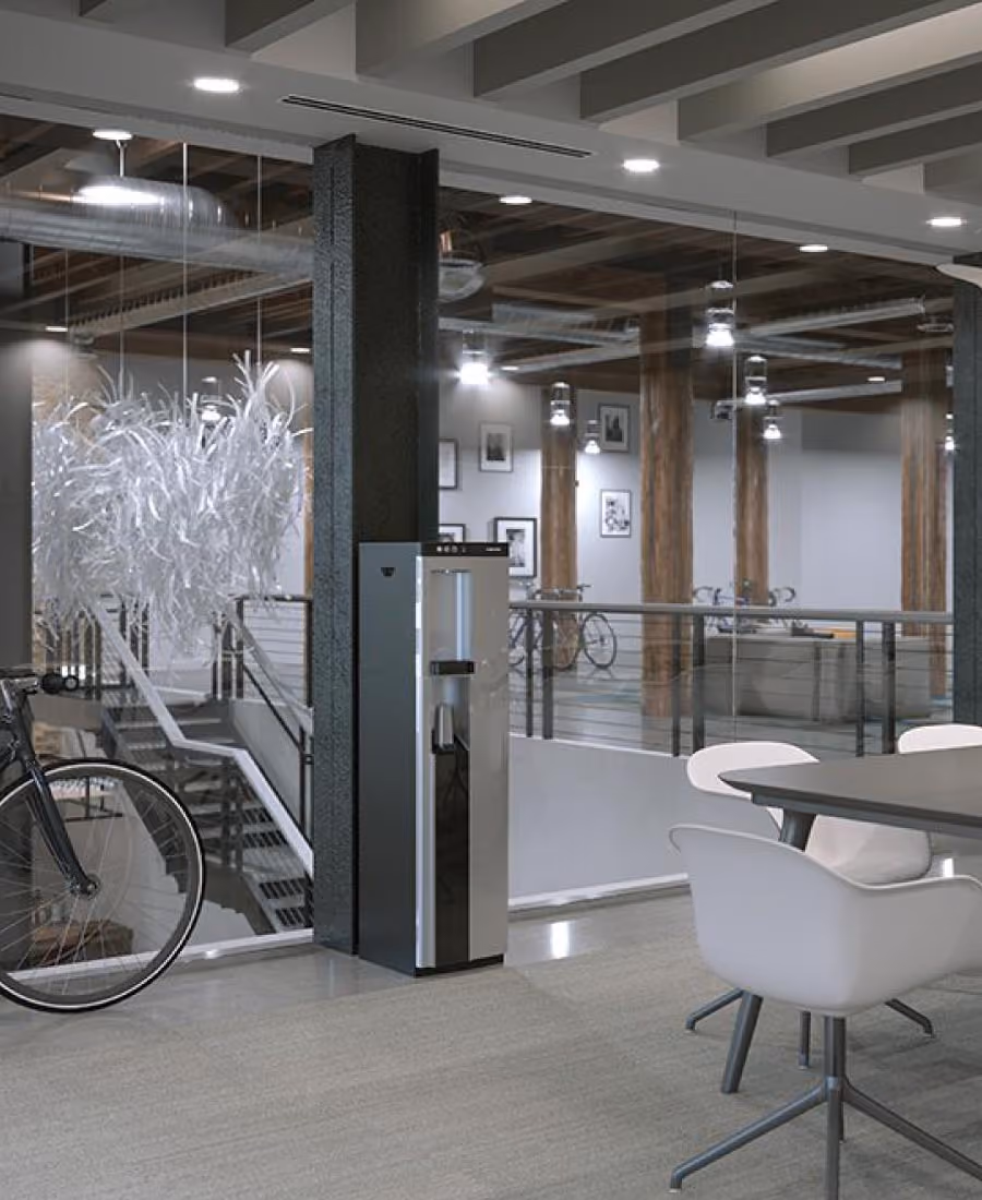 Borg & Overström B4 floor-standing dispenser in silver in an office setting