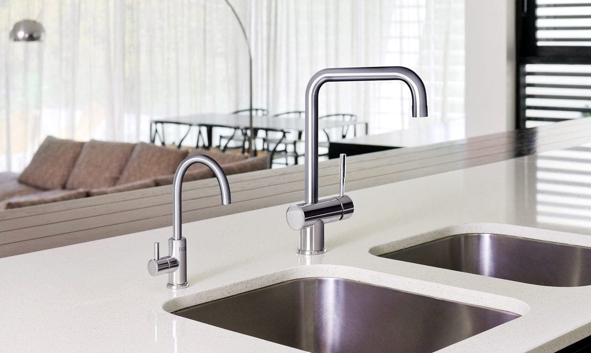 Billi round slimline tap on a kitchen island sink