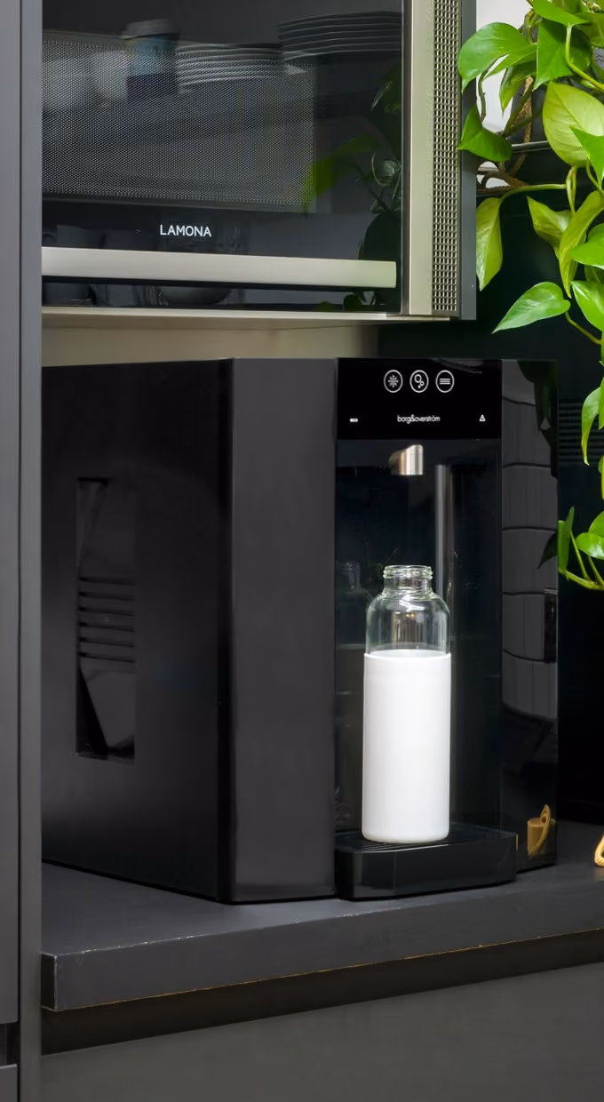 Borg & Overström countertop water dispenser in black in an office kitchen