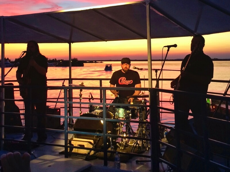 Live music being played on our Cruise For a Cause as the sun sets on a beautiful summer evening.