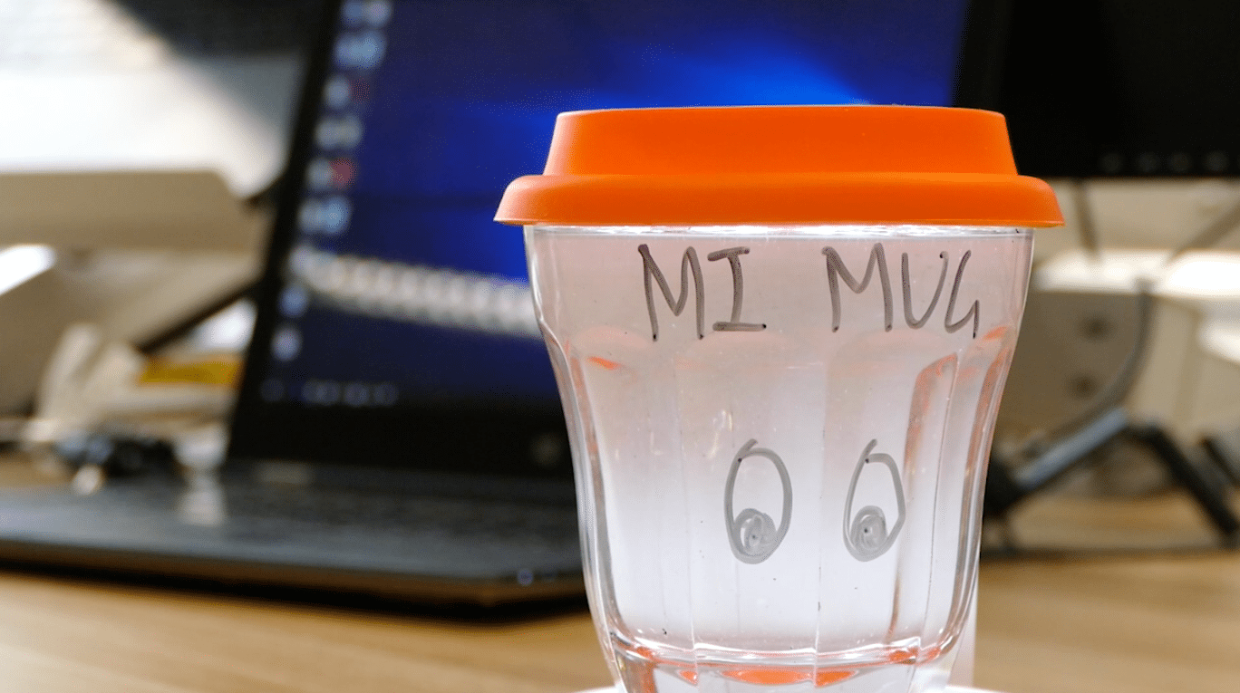 Image of a mug prototype with teh words "mimug" on it