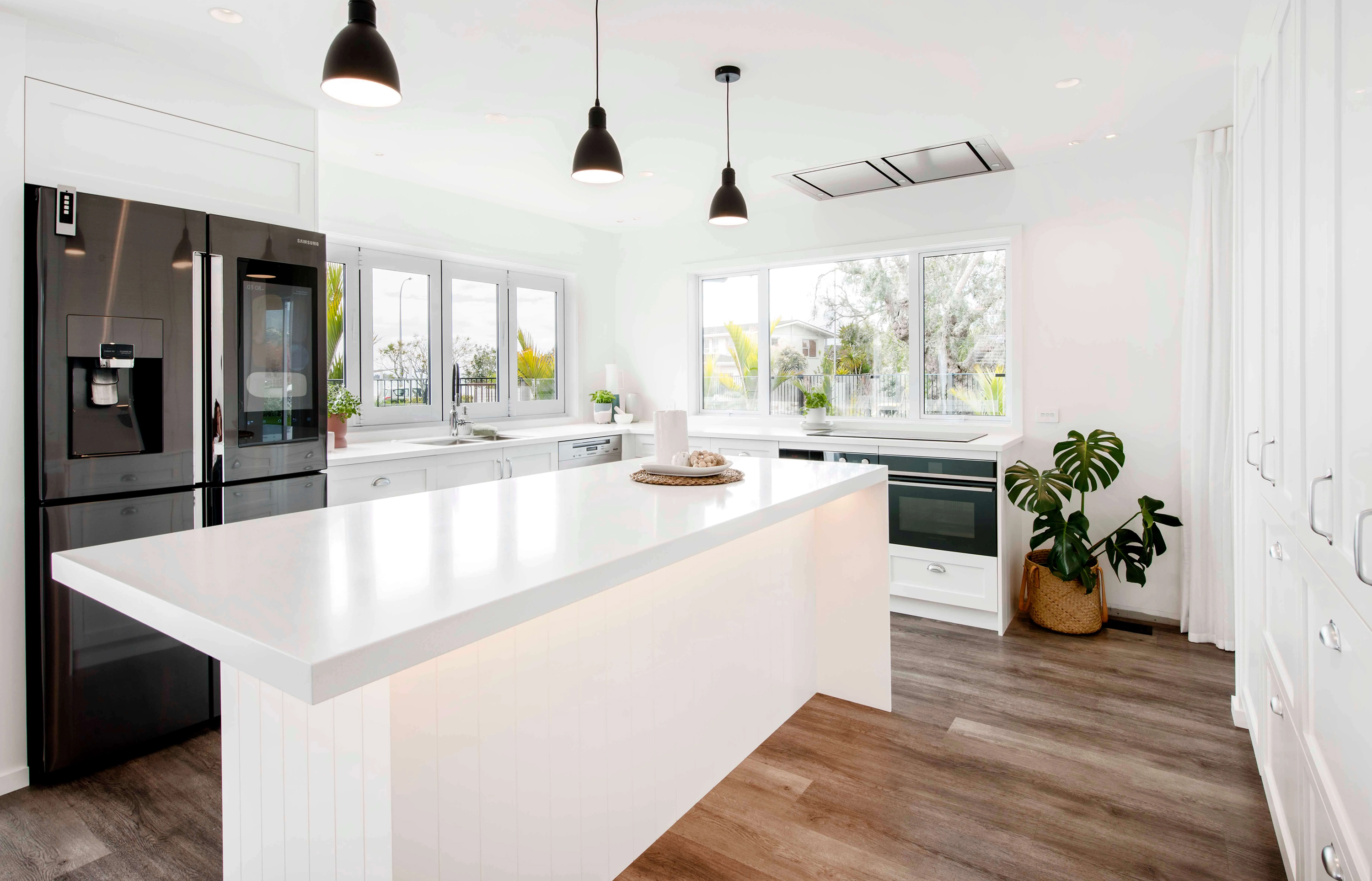 The Monaco Beach Home by Cooper Webley featuring the UM4220-12S Silent Ceiling Cassette Rangehood