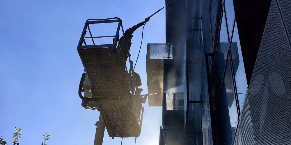 Cleaning building from elevated platform