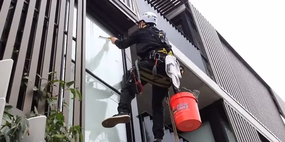 Window cleaning using rope access