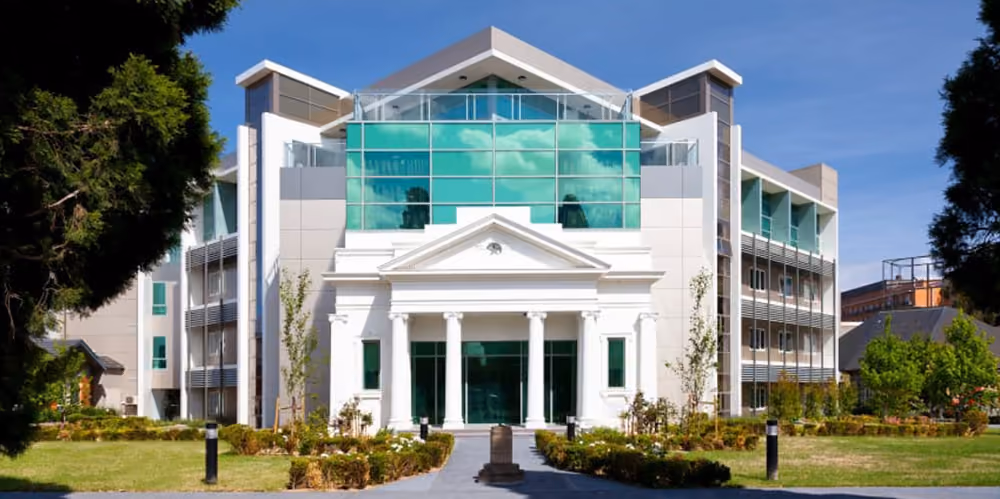 Professional exterior cleaning of a modern aged care facility with spotless windows and a well-maintained entrance.