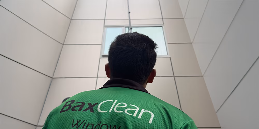Bax Clean technician carrying out professional window cleaning at an aged care facility to maintain a clean and welcoming environment.