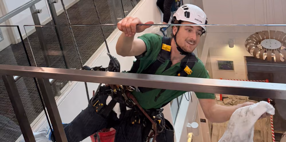 Rope access technicians cleaning the internal glass atrium at the premium retirement complex.