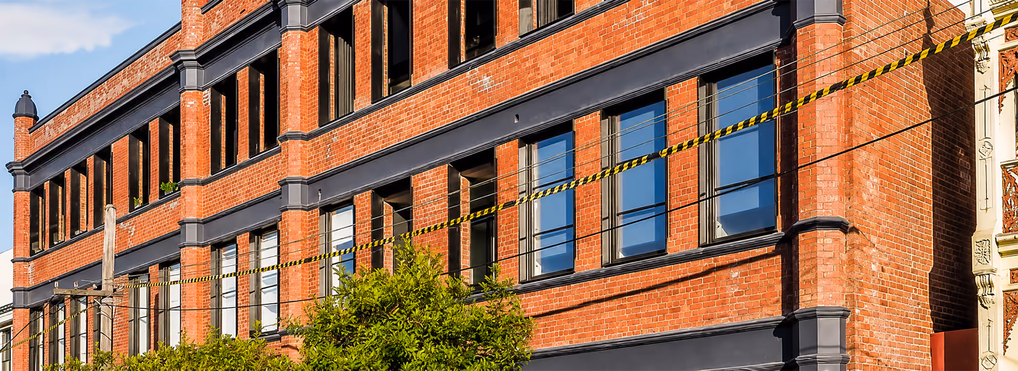 Restored heritage brick façade at the West Melbourne residential development.