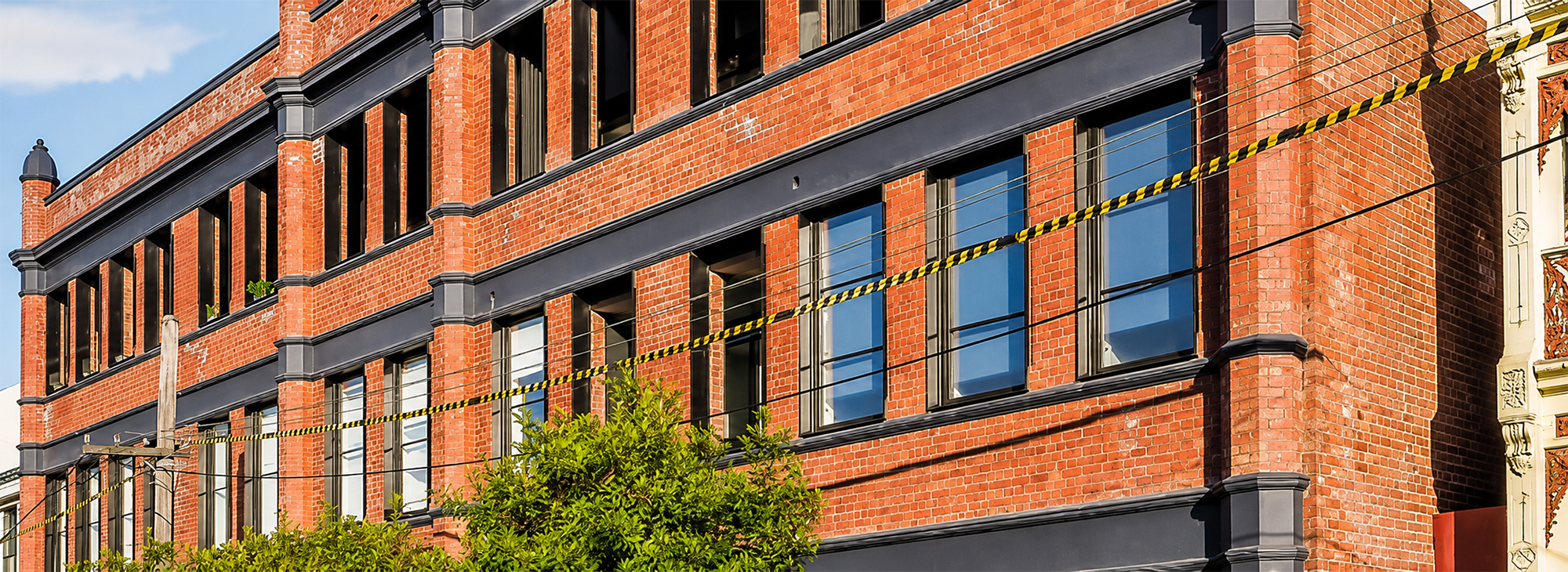 Restored heritage brick façade at the West Melbourne residential development.