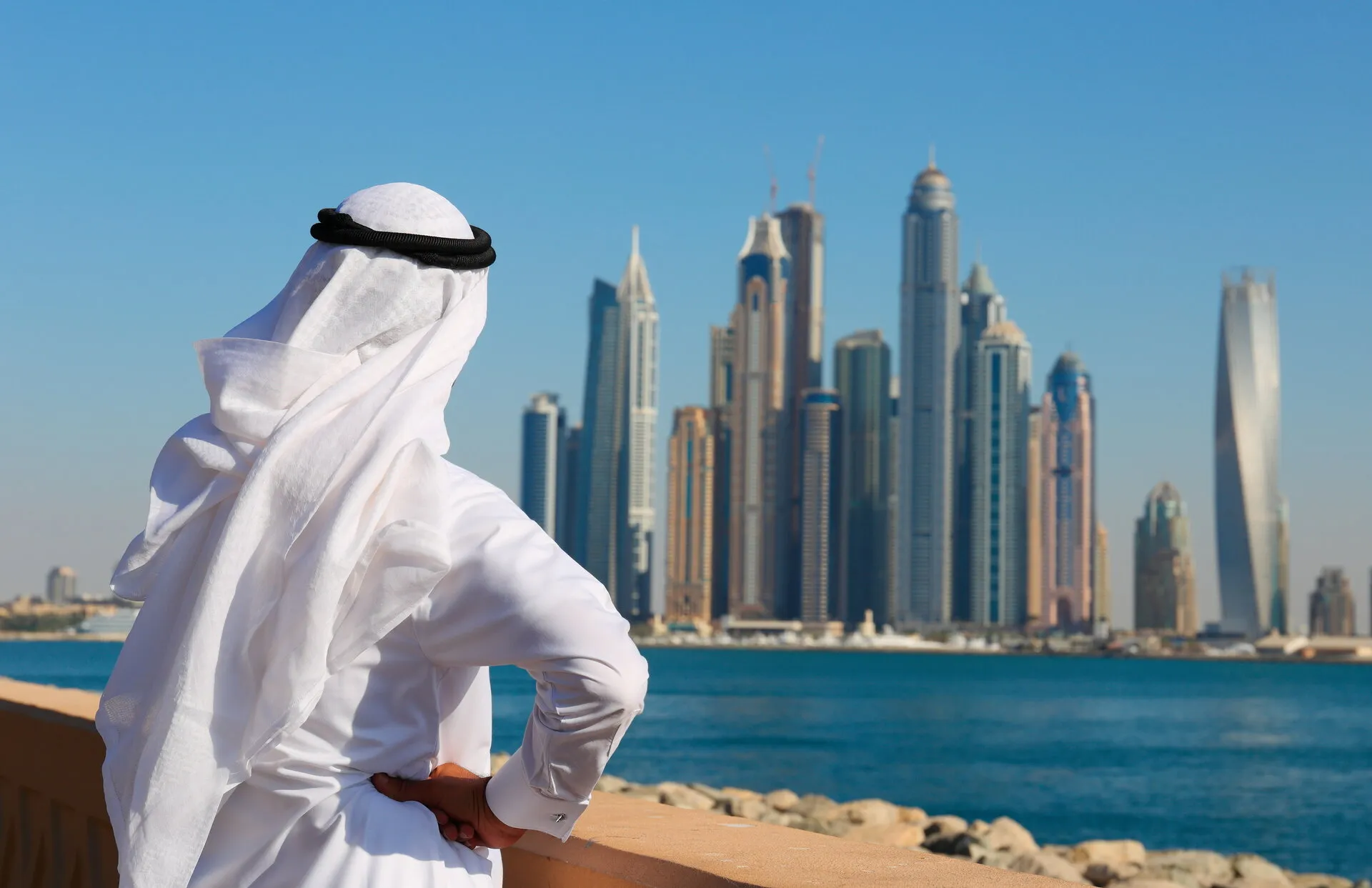A man looks out at the Dubai skyline in the United Arab Emirates. Illustrative photo: Shutterstock