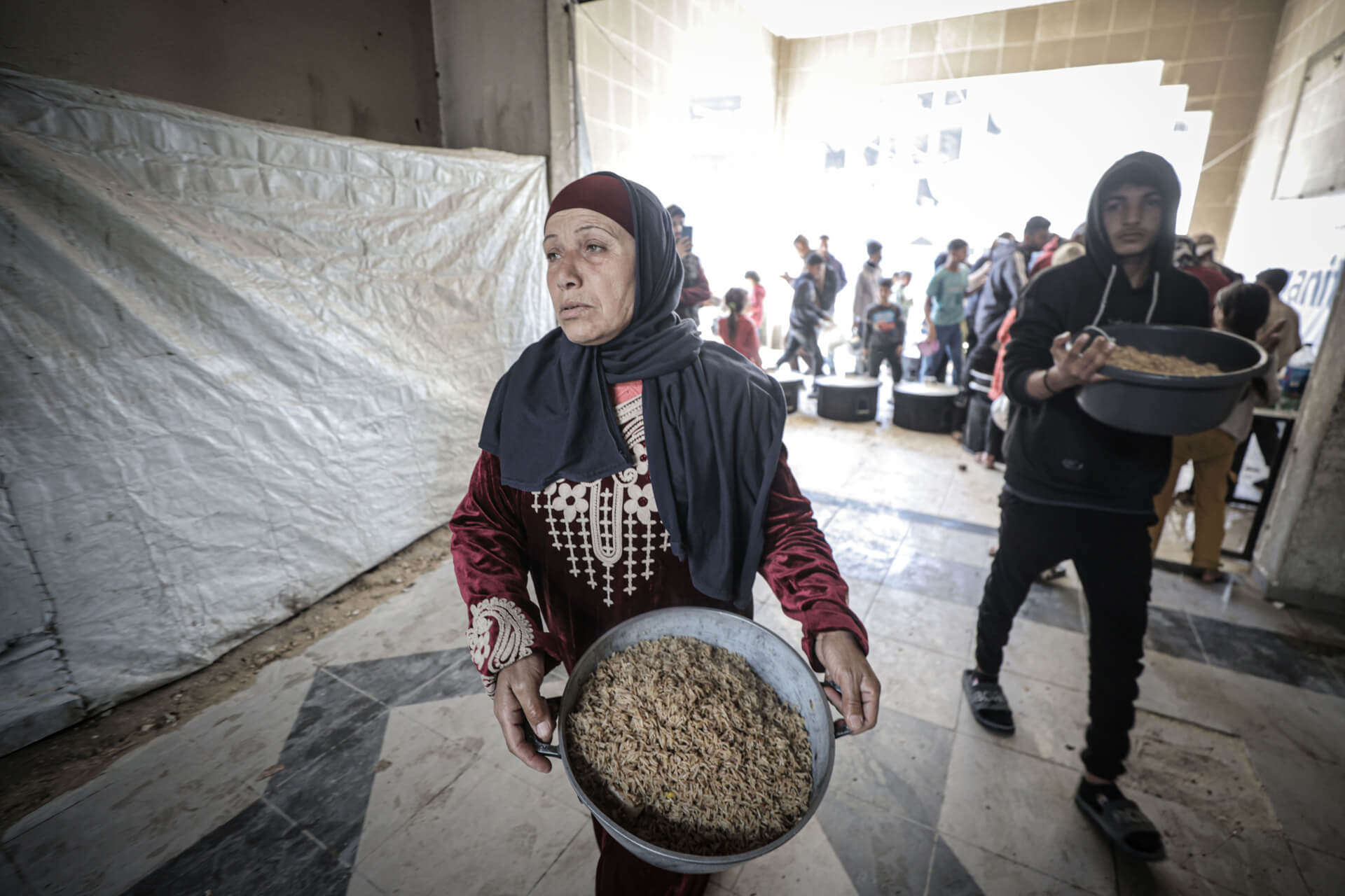 חלוקת סיוע הומניטרי בעזה השבוע. צילום: רויטרס